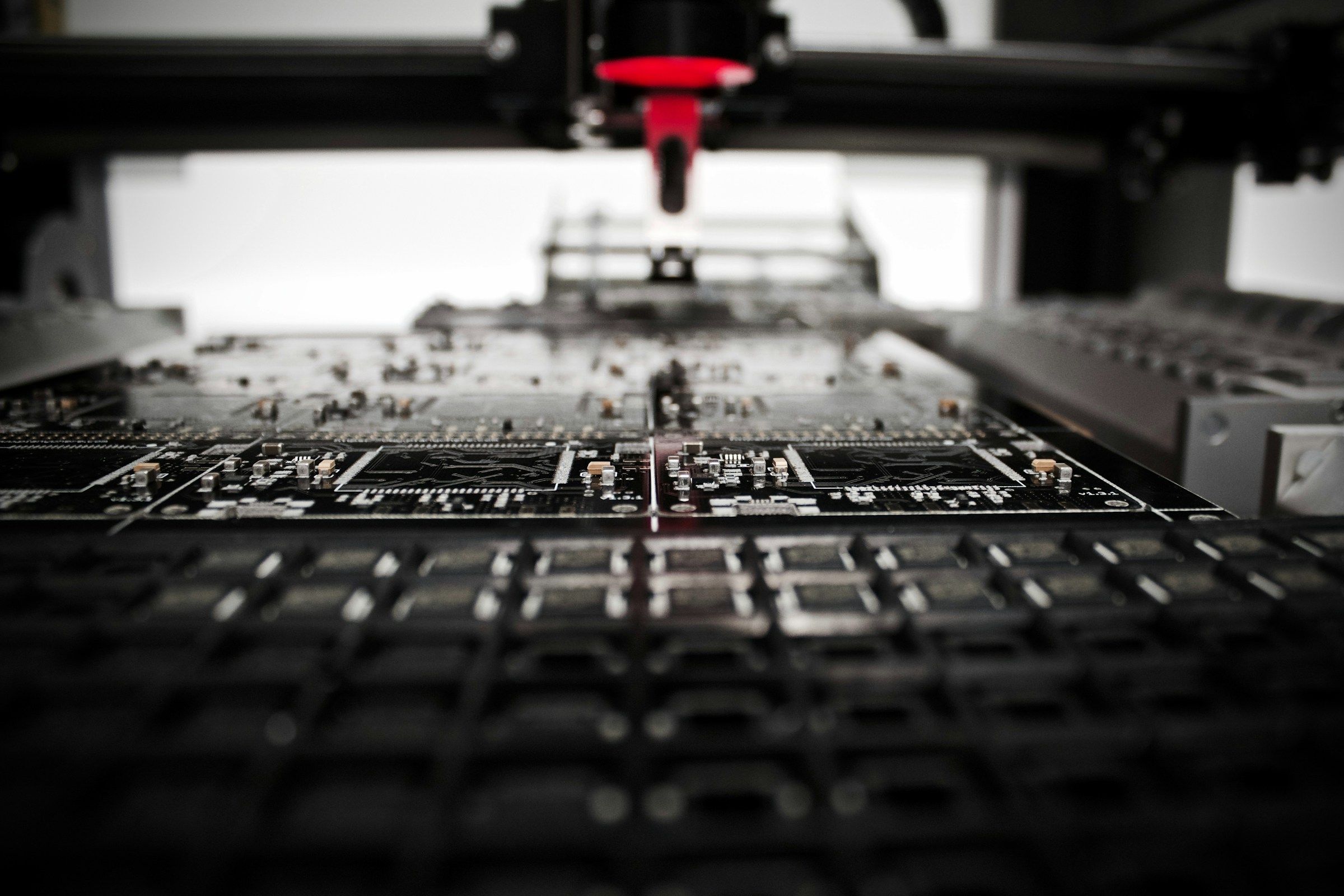 Pick and place machine assembling circuit boards